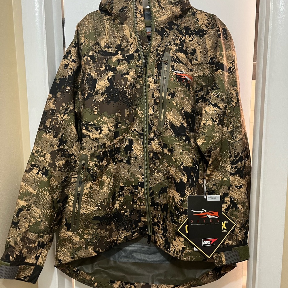 Cold front jacket from sitka in a darker ground forest camo.